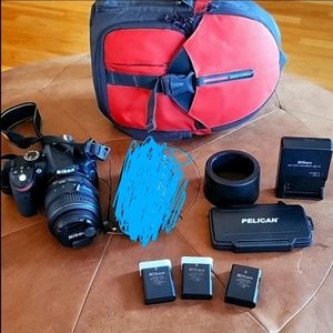 Nikon D3200 camera and 18-55 wide angle lense, and other extras